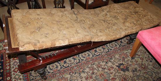 Carved cane panelled day bed